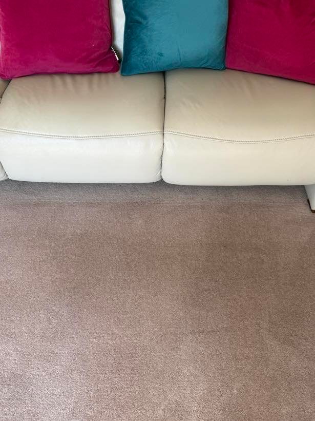 The same lounge carpet, cream leather suite after cleaning by Nottingham Carpet Care