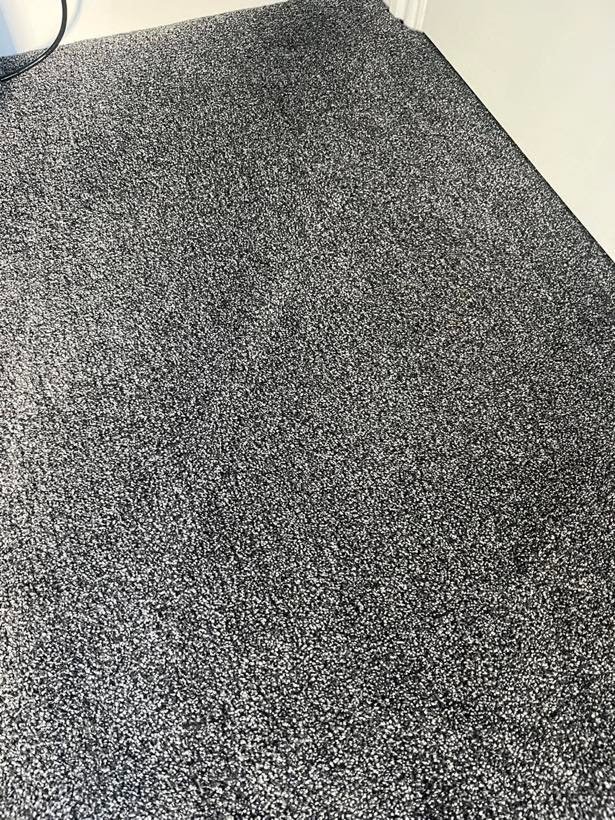 The same spill on a speckled carpet after cleaning by Nottingham Carpet Care